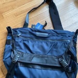 BRAND NEW w/tags - schkleier sling bag blue bike riding walking laptop section!